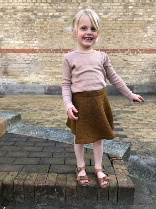 Hovedbilde Løvetannskjørt PetitKnit
